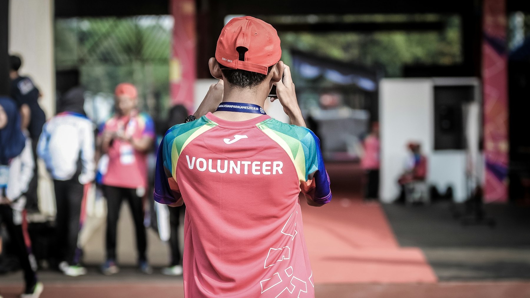 A volunteer at a community event — the world Benevity's search is meant to connect employees to.